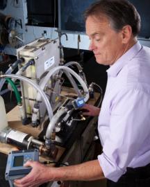 Soil scientist testing his solar-powered electrodialysis system.