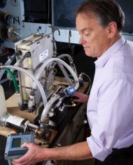 Soil scientist testing his solar-powered electrodialysis system.