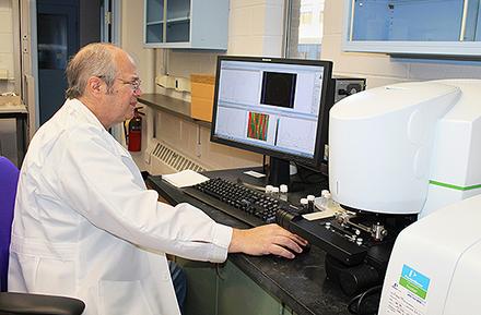 ARS chemist Gordon Selling working at a computer